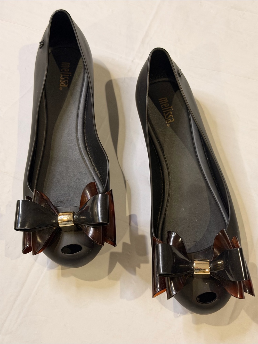 Melissa Black Jelly Flats with Brown Bow and Gold Accent